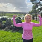 Midlife woman exercising outdoors in sunlight to support vitamin D and menopause health
